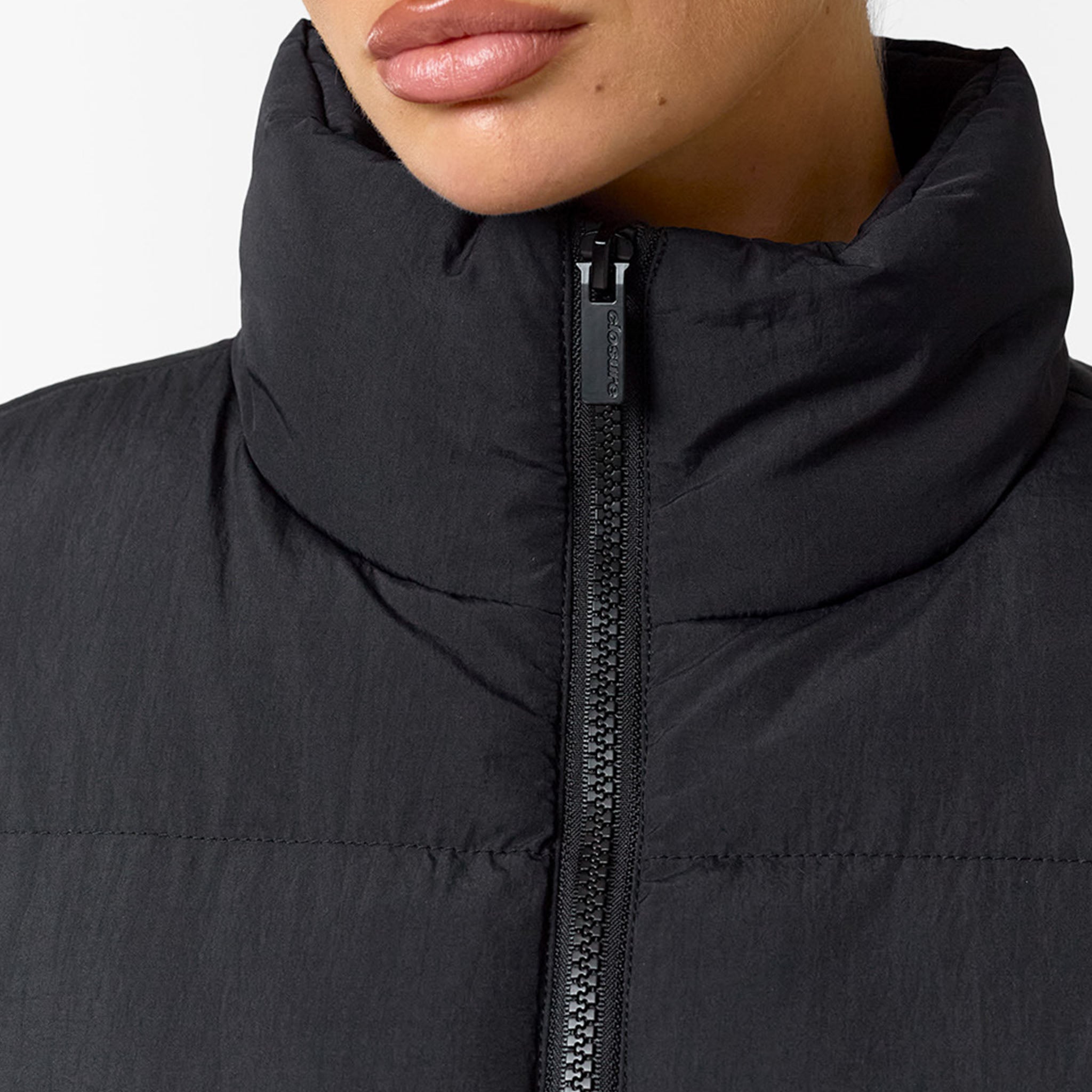 Elegante Steppweste Lang Damen in Schwarz | Stilvolles Layering-Element mit Stehkragen 3